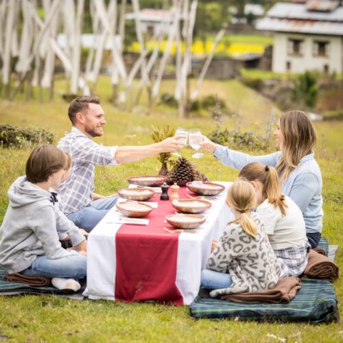 Family enjoying outdoor dining in Bhutan